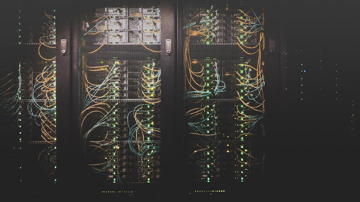 Server racks with structured cabling inside a client data center